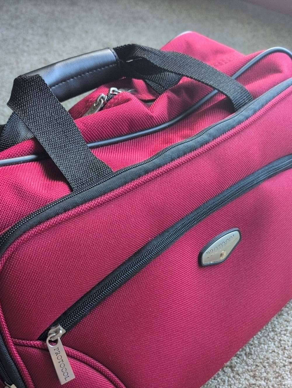 Red Travel Bag with Black Handles